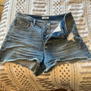 Good American distressed denim shorts